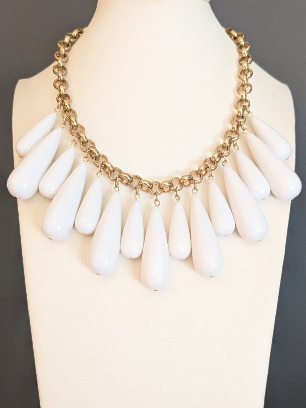 Dramatic statement white hanging beaded necklace on chunky gold chain